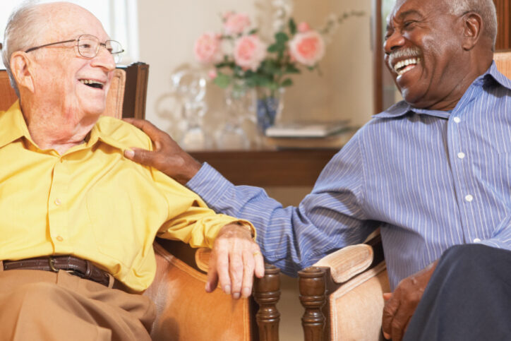 Two Senior Men Senior men chatting in the common area