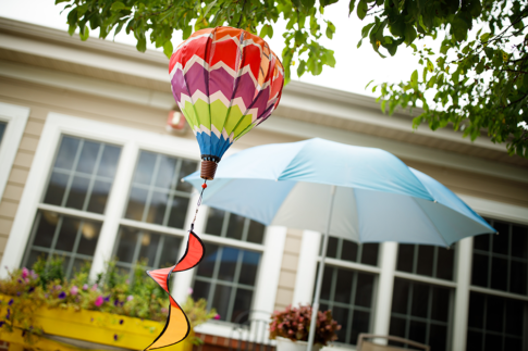 Outdoor lawn ornament hanging in the courtyard tree